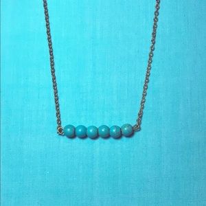 turquoise beaded bar necklace on gold chain